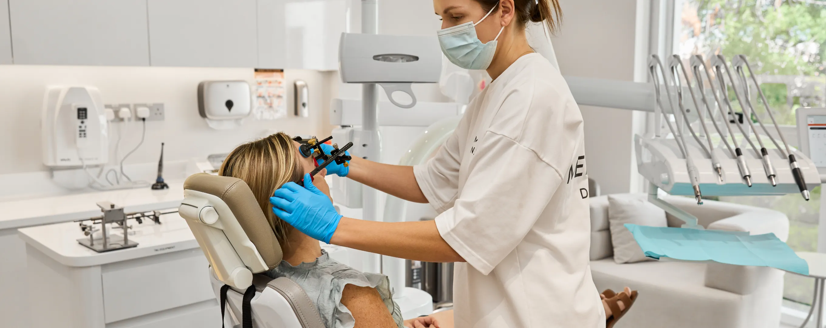 Positioning the recording system to record lower jaw movements